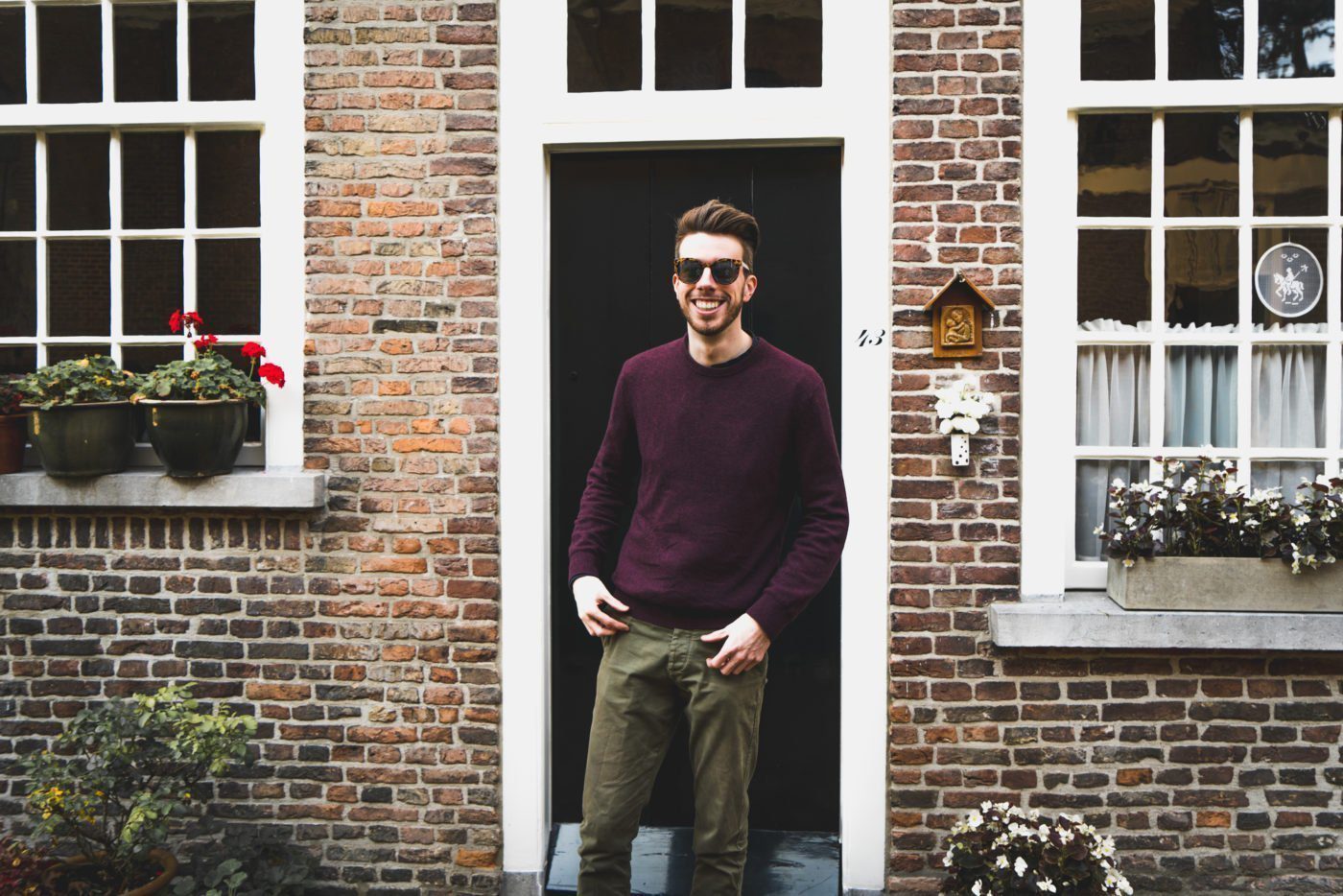 me in front of a door of a house in the beguinage