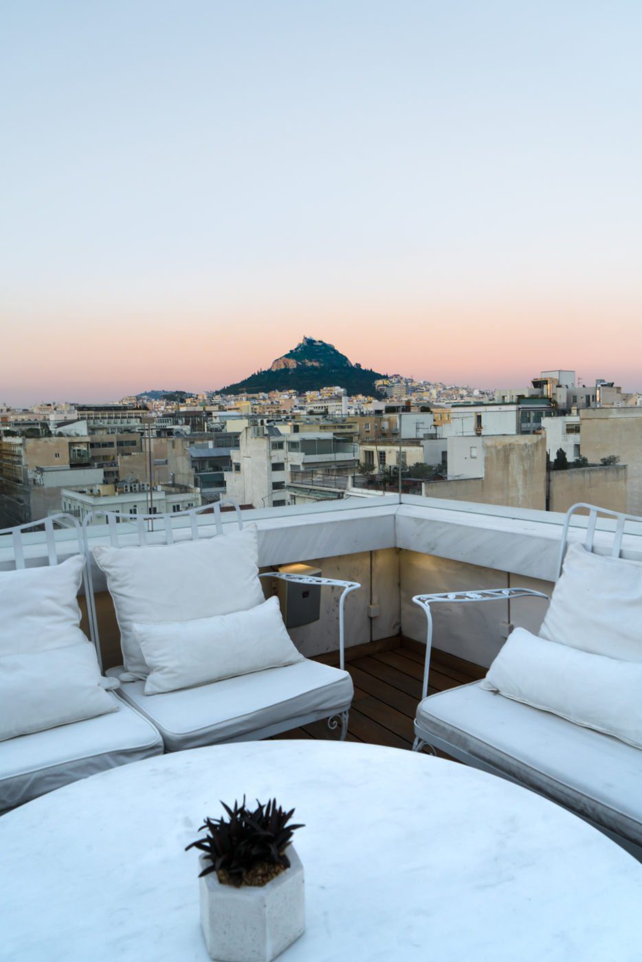 View of Mount Lycabettus from the rooftop bar at NEW Hotel