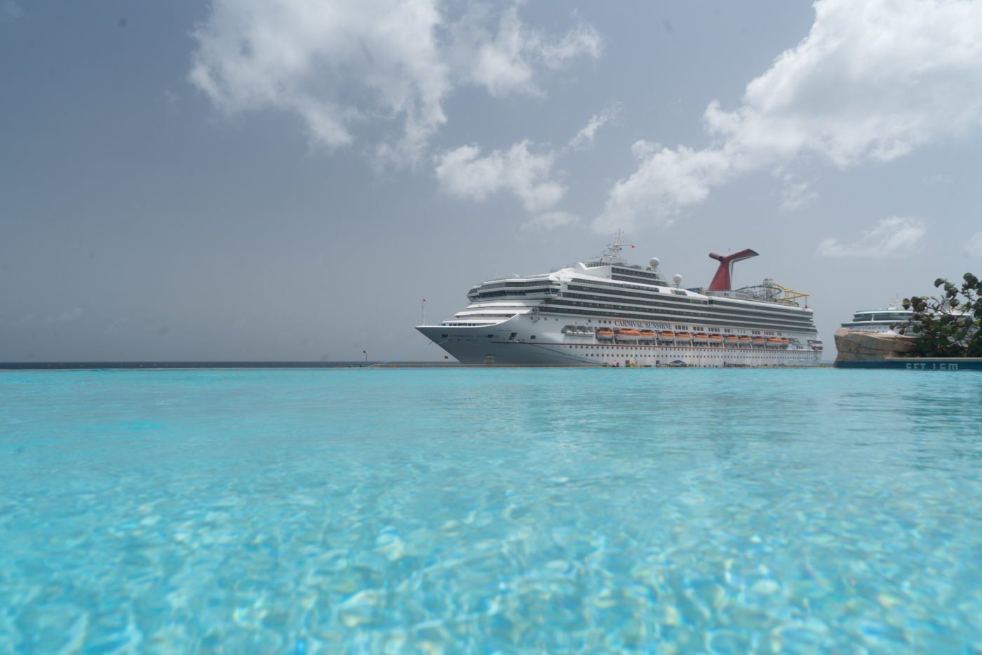 Carnival cruise ship seen from the infinity pool at Renaissance Resort, Curaçao